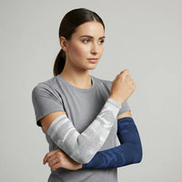 Model wearing mixed camo UV arm sleeves—grey camo and navy camo—cooling, breathable sun sleeves with non-slip band — Sportive Lives Canada