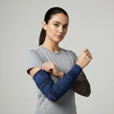 Model wearing navy camo and charcoal camo UV arm sleeves — cooling, breathable sun sleeves with non-slip band — Sportive Lives Canada