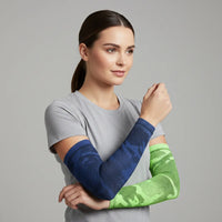 Model wearing navy camo and green camo cooling UV arm sleeves — breathable sun sleeves with a non-slip band — Sportive Lives Canada