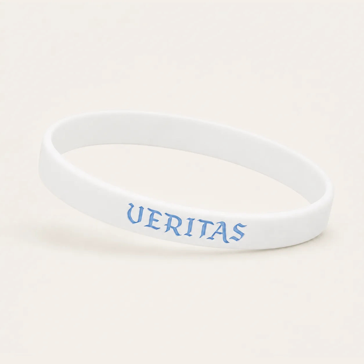White silicone wristband with blue VERITAS lettering
