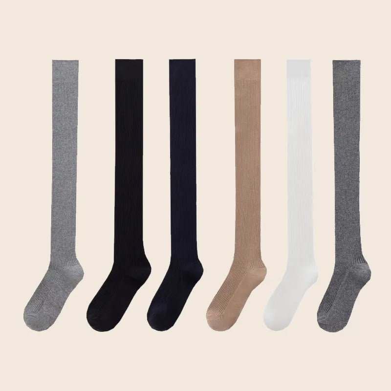Full-length view of women's Sportive Lives knee-high socks available in multiple minimalist colors, perfect for casual wear and yoga.