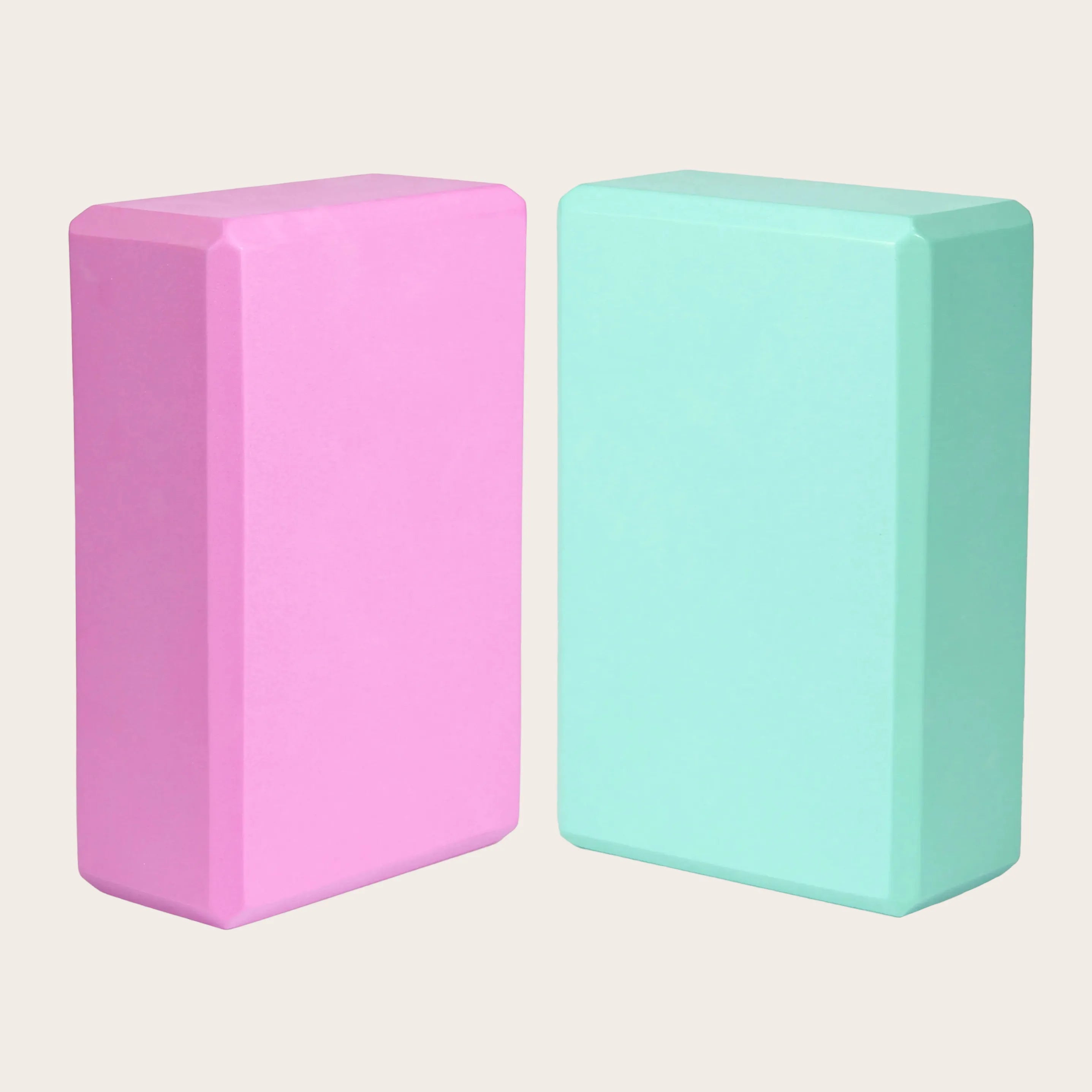 Pair of Sportive Lives yoga blocks in pink and mint green EVA foam, ideal for yoga beginners and advanced poses in Canada