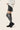 Graphite grey over-the-knee ribbed socks styled with black leather mini skirt and boots.