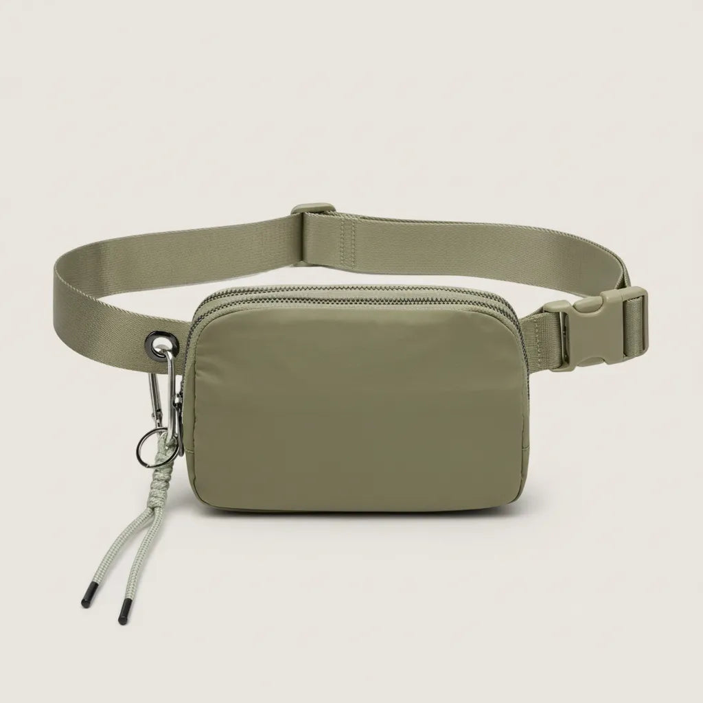 Front view of an olive water-resistant nylon belt bag with adjustable strap, dual zippers and a detachable carabiner key clip.