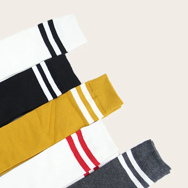 Close-up detail of stylish socks low from Sportive Lives, highlighting classic retro double stripes and soft cotton fabric, ideal for fashionable spring and summer wear.