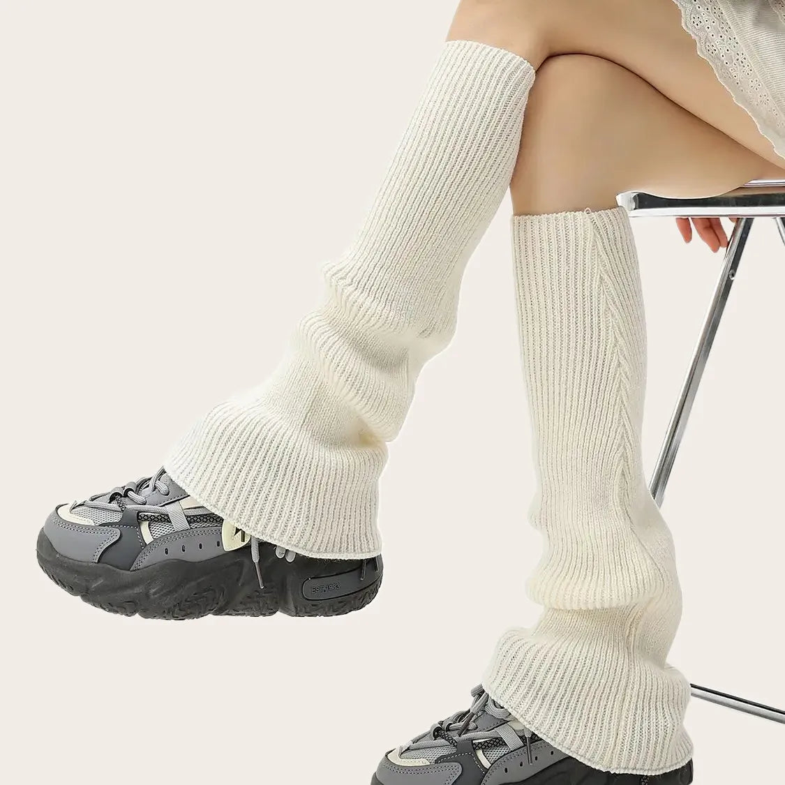 Soft white over-the-knee leg warmers for girls or women, perfect for cold weather layering.