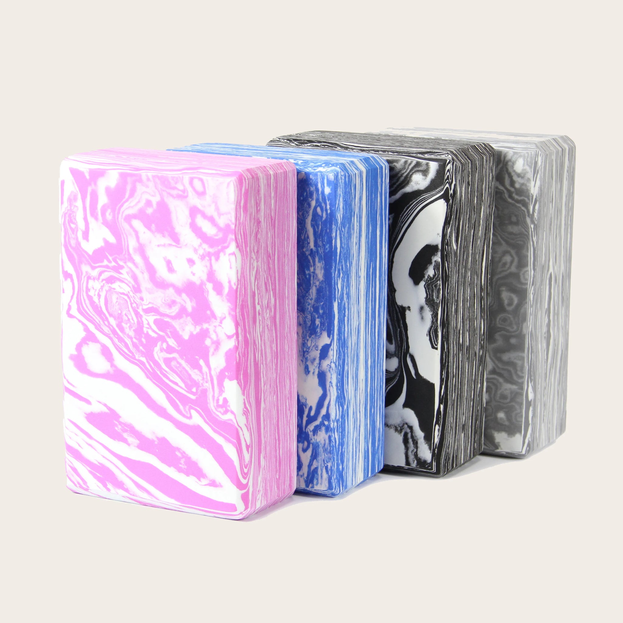 Set of four Yoga Block CLOUD bricks in unique marble patterns. Lightweight, eco-friendly, and non-slip yoga props for flexibility, balance, and deepening poses. Available in Canada.