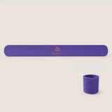 Purple Yoga Mat Slap Band shown flat and coiled for securing a rolled yoga mat